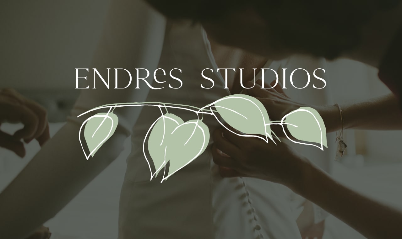 Endres Studios logo on top of a background of a person buttoning up a wedding dress